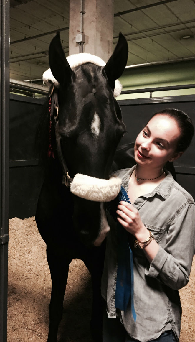 This picture was taken after my first class. Tyler liked eating the ribbon more than taking the picture.