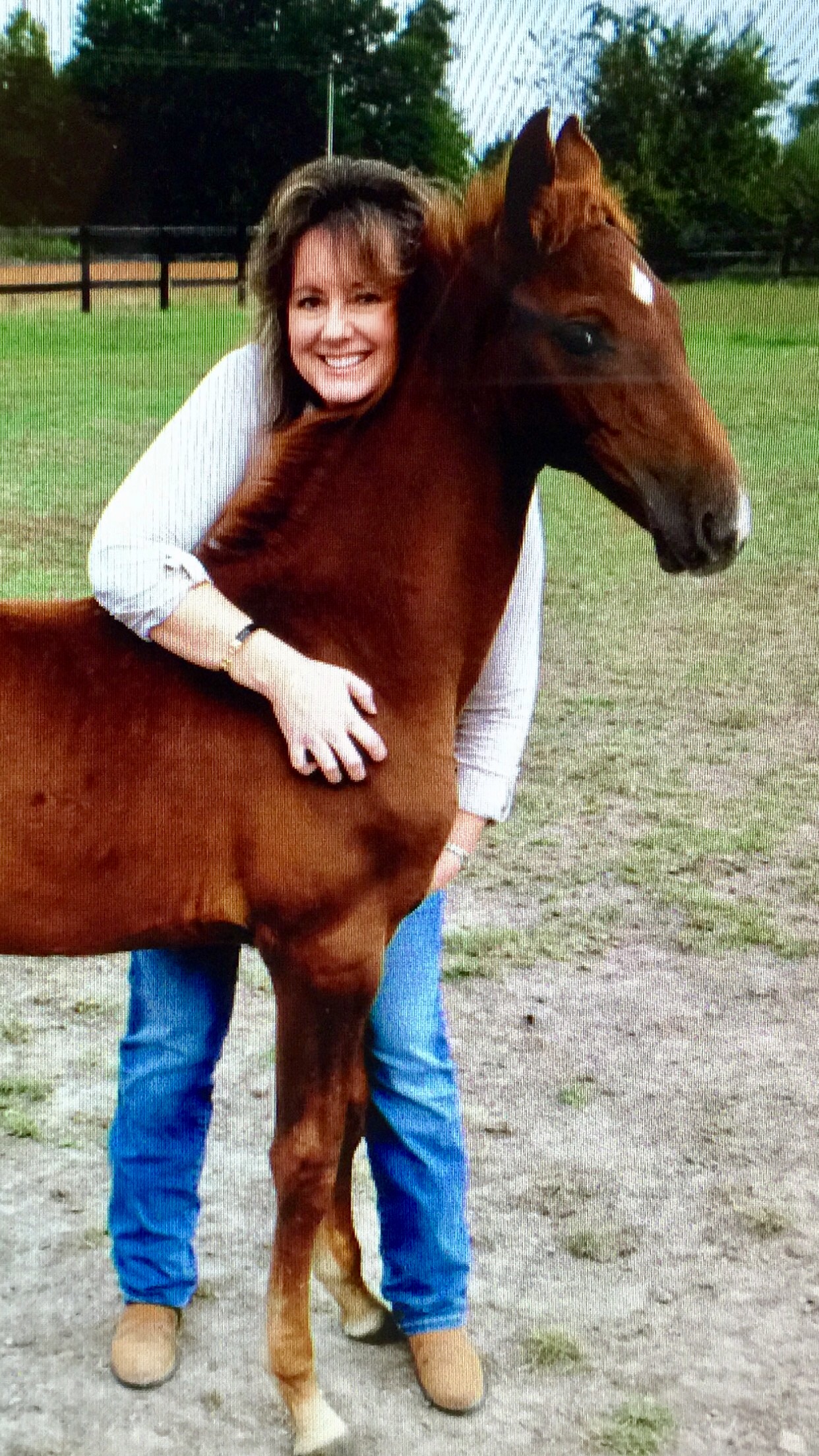 ASR Registrar Lisa Duncan with Winslow, one of the foals she bred.