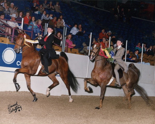 A double victory pass -- just one of the great moments that happened during the 1992 AHSA Medal Finals when champion Emily Swanson switched horses with her barn mate and best friend.