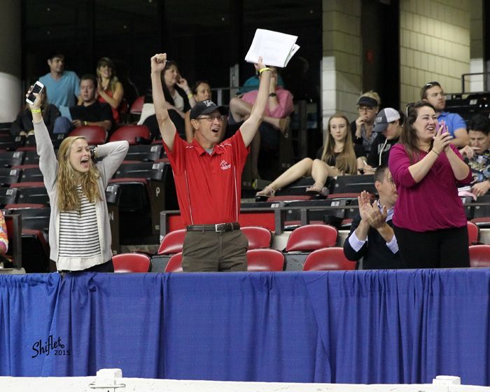 McGee Bosworth and her father Allen celebrate trainer Mary Orr's win with CH Lets Talk at Louisville in 2015. McGee was unable to show T because of her college orientation schedule.