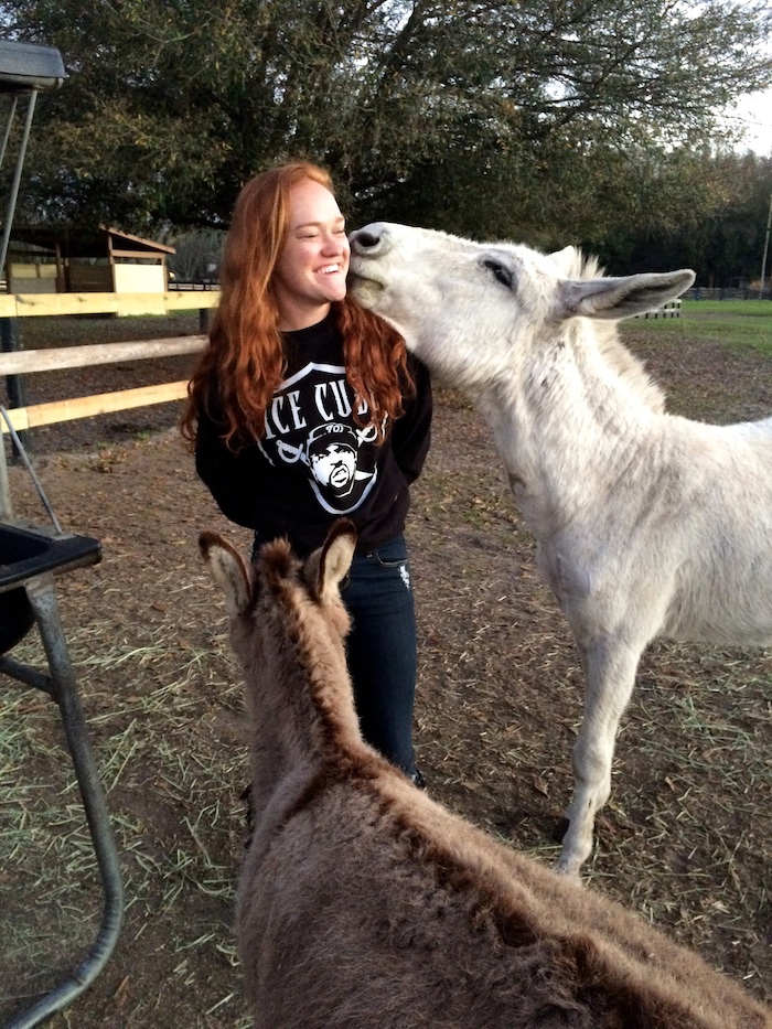 Ali spends some time with donkeys Sloopy and Schroder.