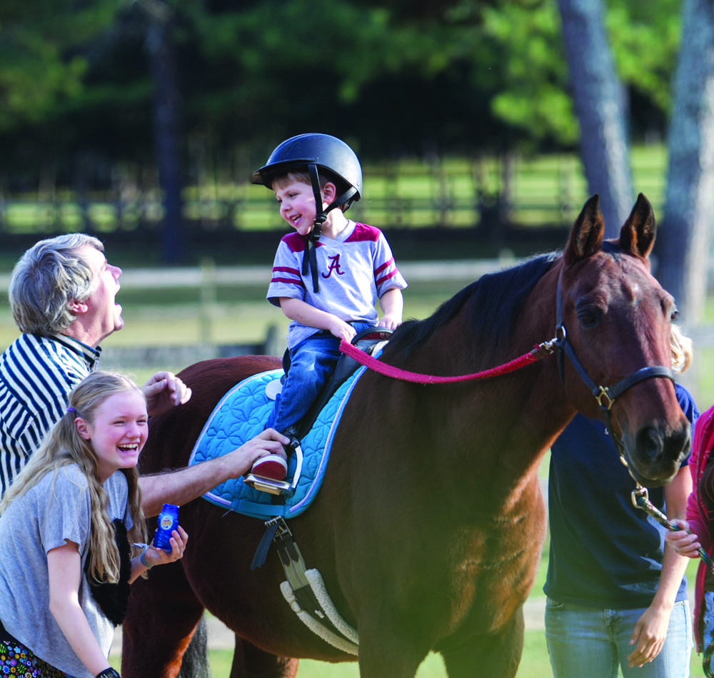 The intuitive nature of horses makes them well suited as therapy animals. At The Red Barn in Leeds, Alabama, they touch the lives of those with physical cognitive and emotional disabilities daily.