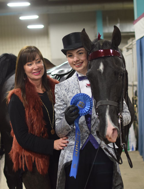 Junior Exhibitor Park Champions and Grand Champions I'ts Aerosmith and Skylar Rueff with her mother Katy.