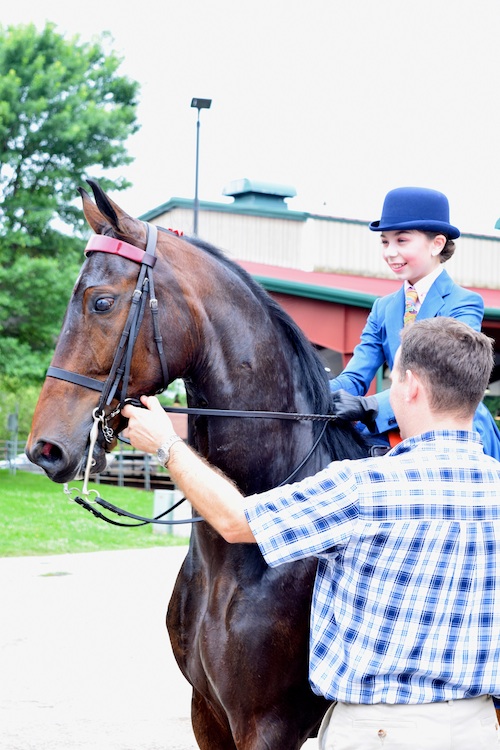 Mallory Pertler rode Designed For Success to win the WalkTrot Pleasure 12 Under qualifier and championship under the direction of Ray Krussel.