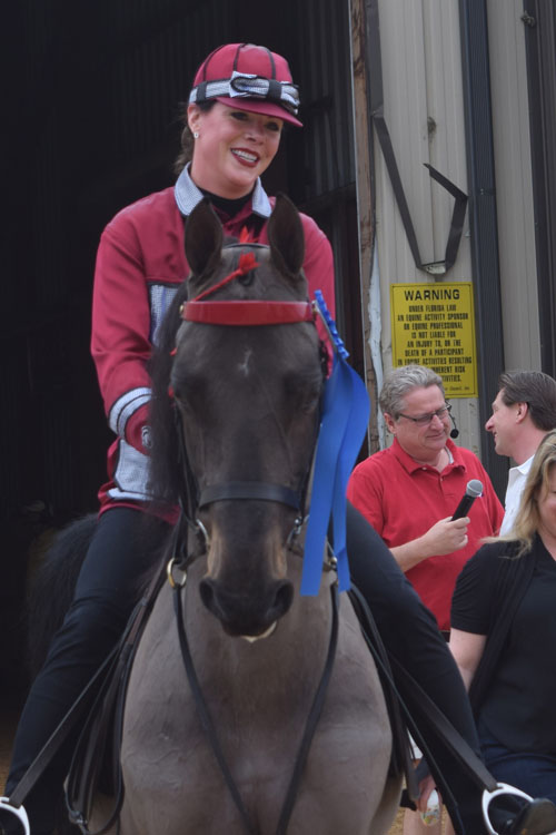 Elizabeth Ghareeb made a blue ribbon debut aboard her new partner SLB Puccini.