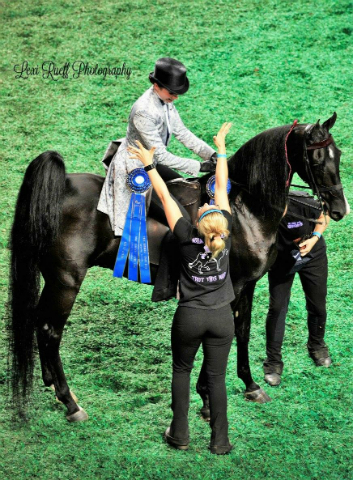 My trainer Jenn Holdren and I after Tyler and I won our qualifier class.